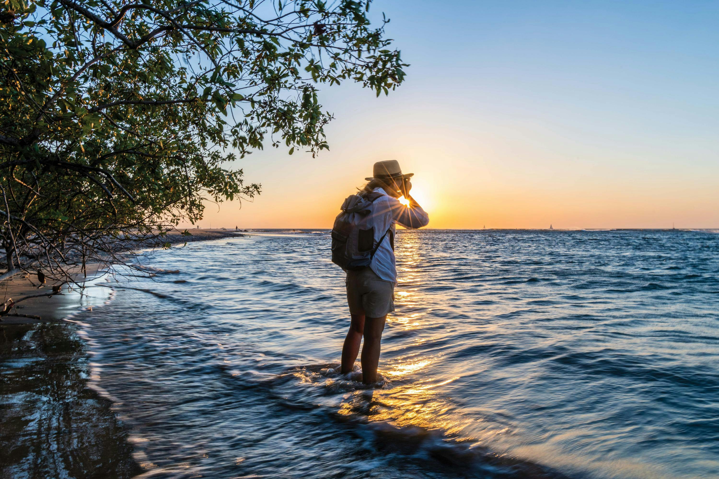 Photographer in .Tamarindo beach, Guanacaste, Costa Rica