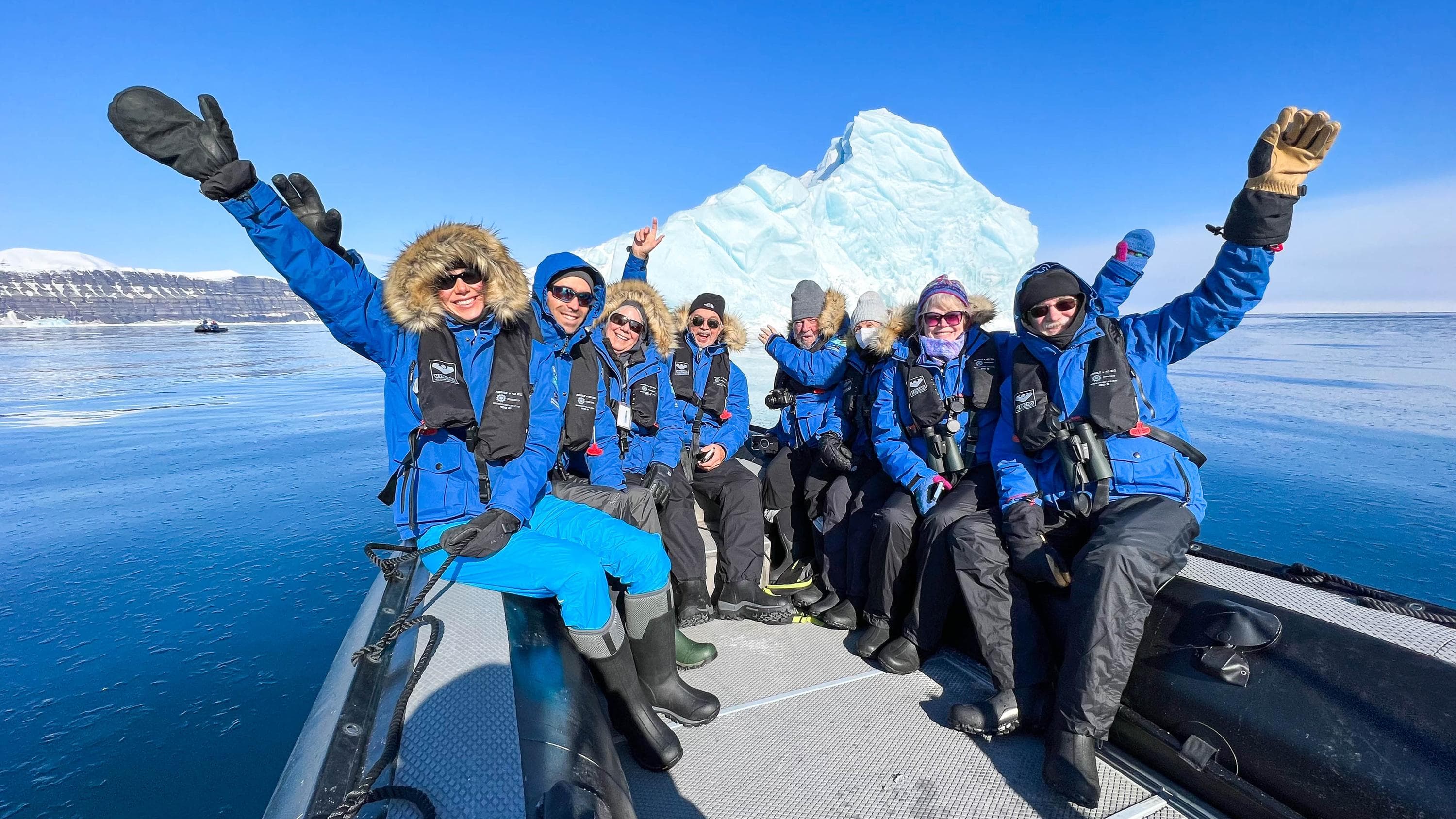 Guests from the National Geographic Endurance on a Zodiac cruise in Storfjord, Svalbard, Norway..