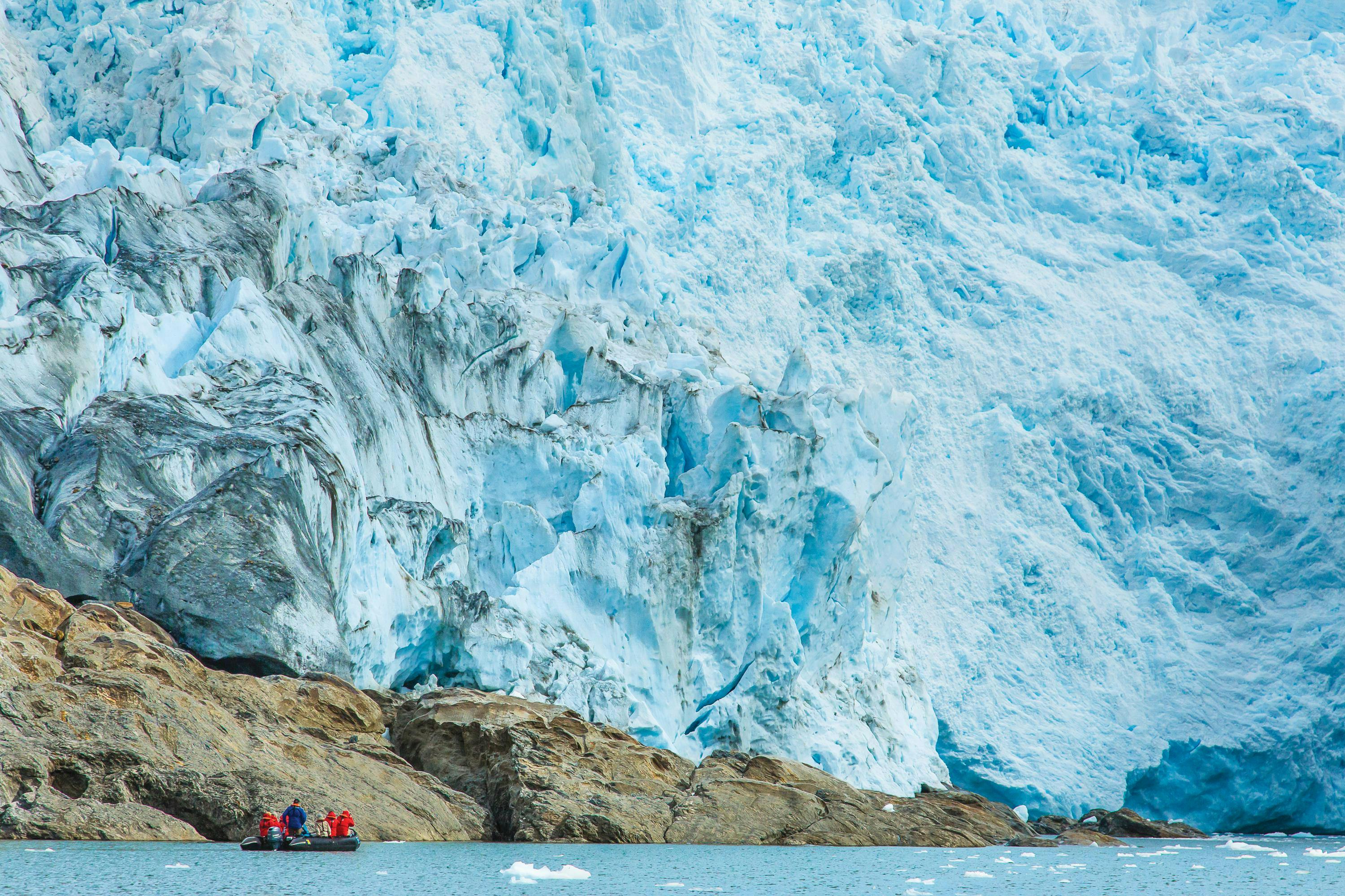 Guests explore a Glacier  by zodiac at Agostini Fjord, Chilean Fjords, Patagonia, Chile