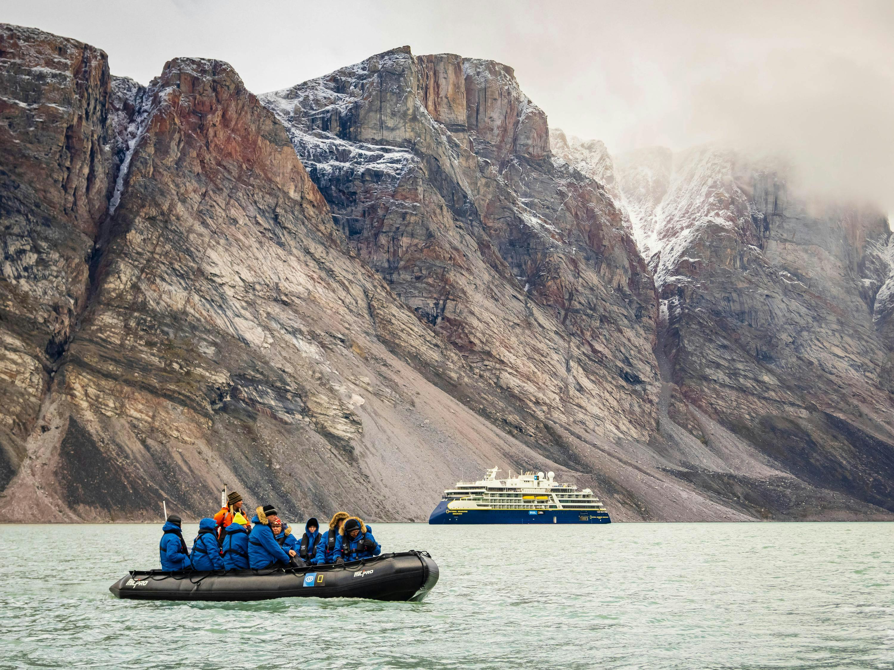 Guests explore by Zodiac from the ship National Geographic Endurance in Buchan Gulf, Baffin Island, Nunavut, Canada