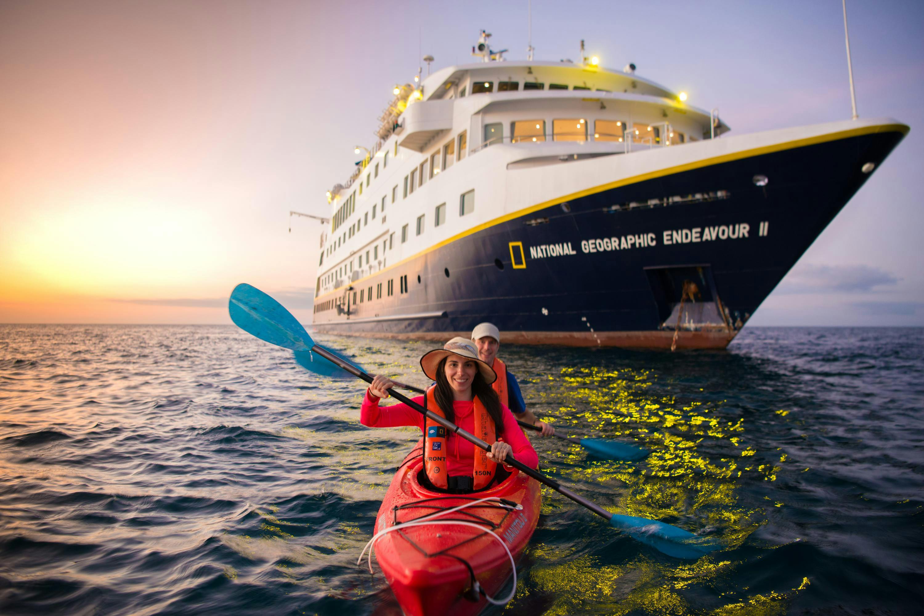 Two guests kayaking from the ship National Geographic Endeavor II, Floreana Island, Ecuador