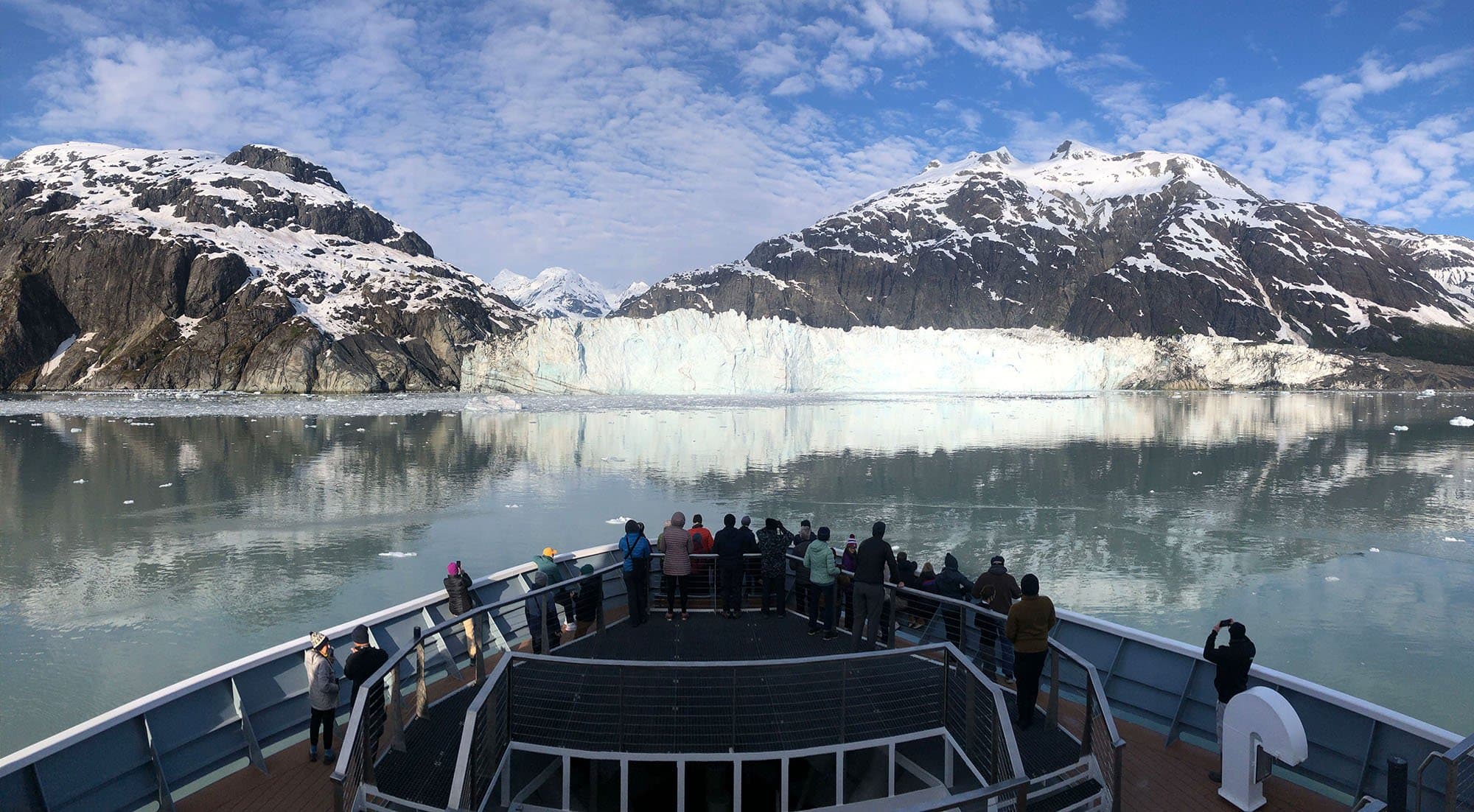 bow of ship with glacier in background