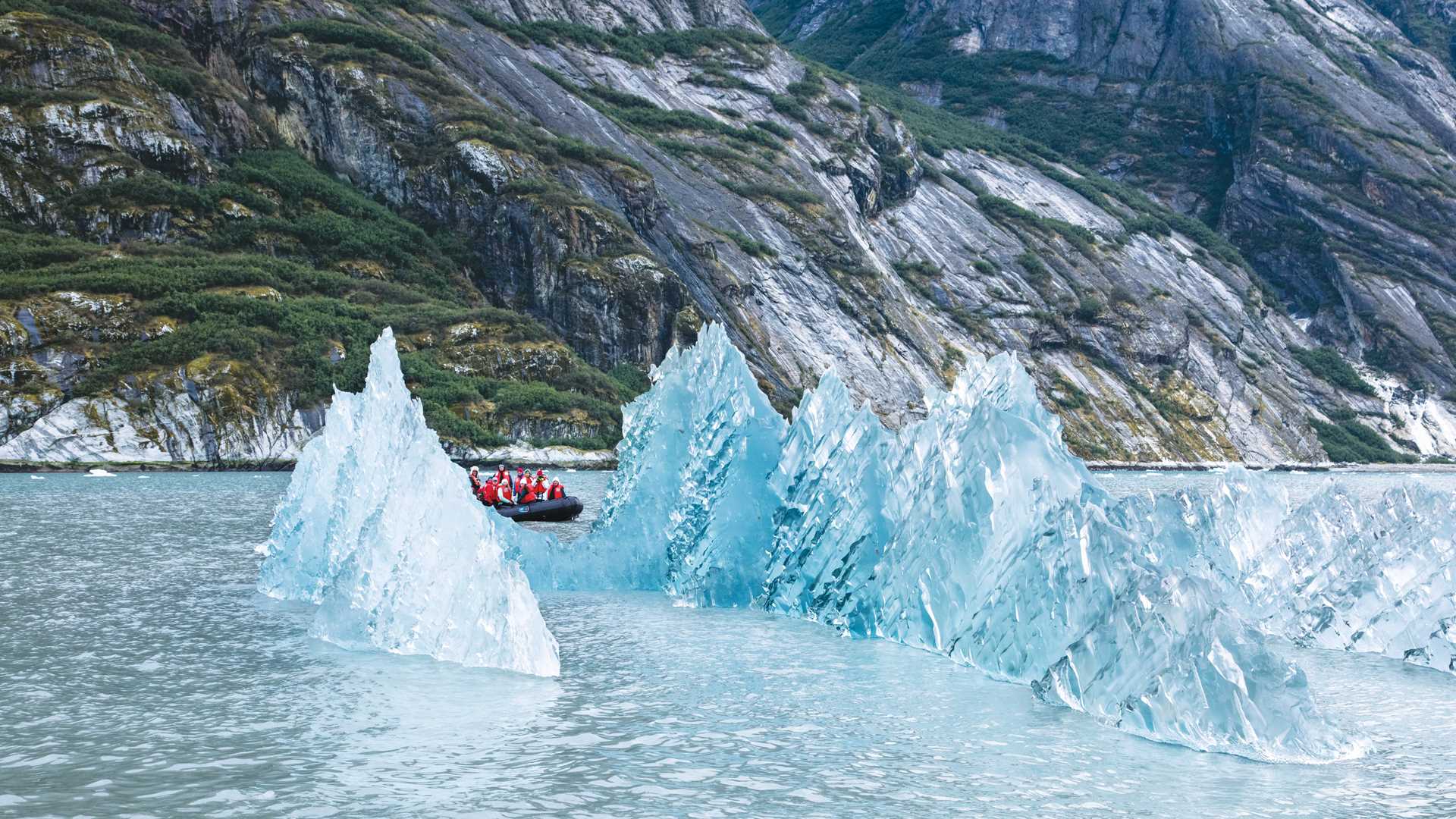 Guests explore the LeConte Glacier by zodiac in Southeast Alaska, USA