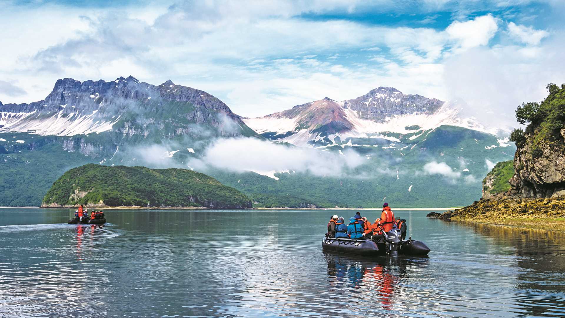 Guests explore by zodiac in Katmai National Park, Alaska, USA