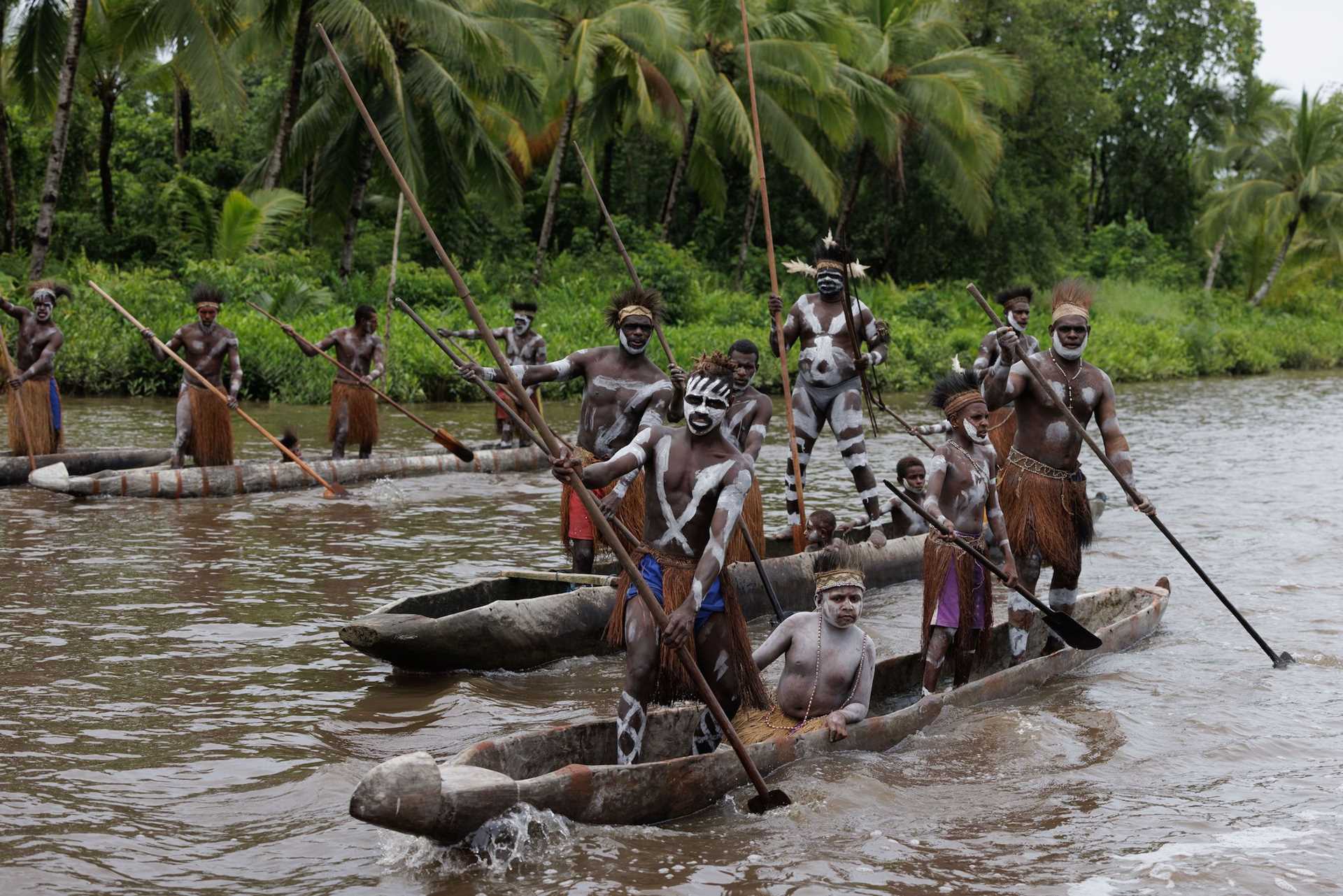 Asmat Canoe Arrival B Garner.jpg