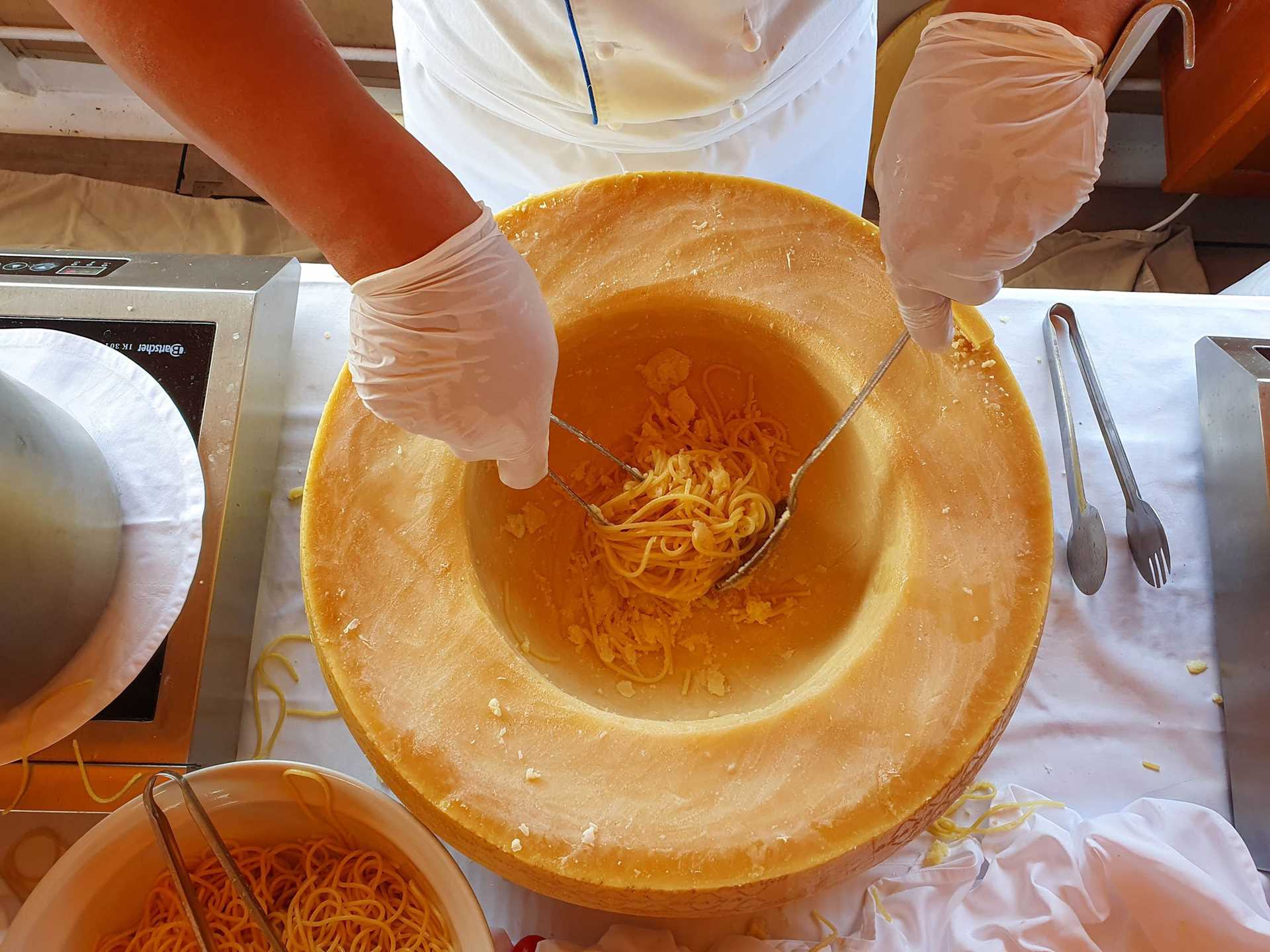 pasta inside a cheese wheel