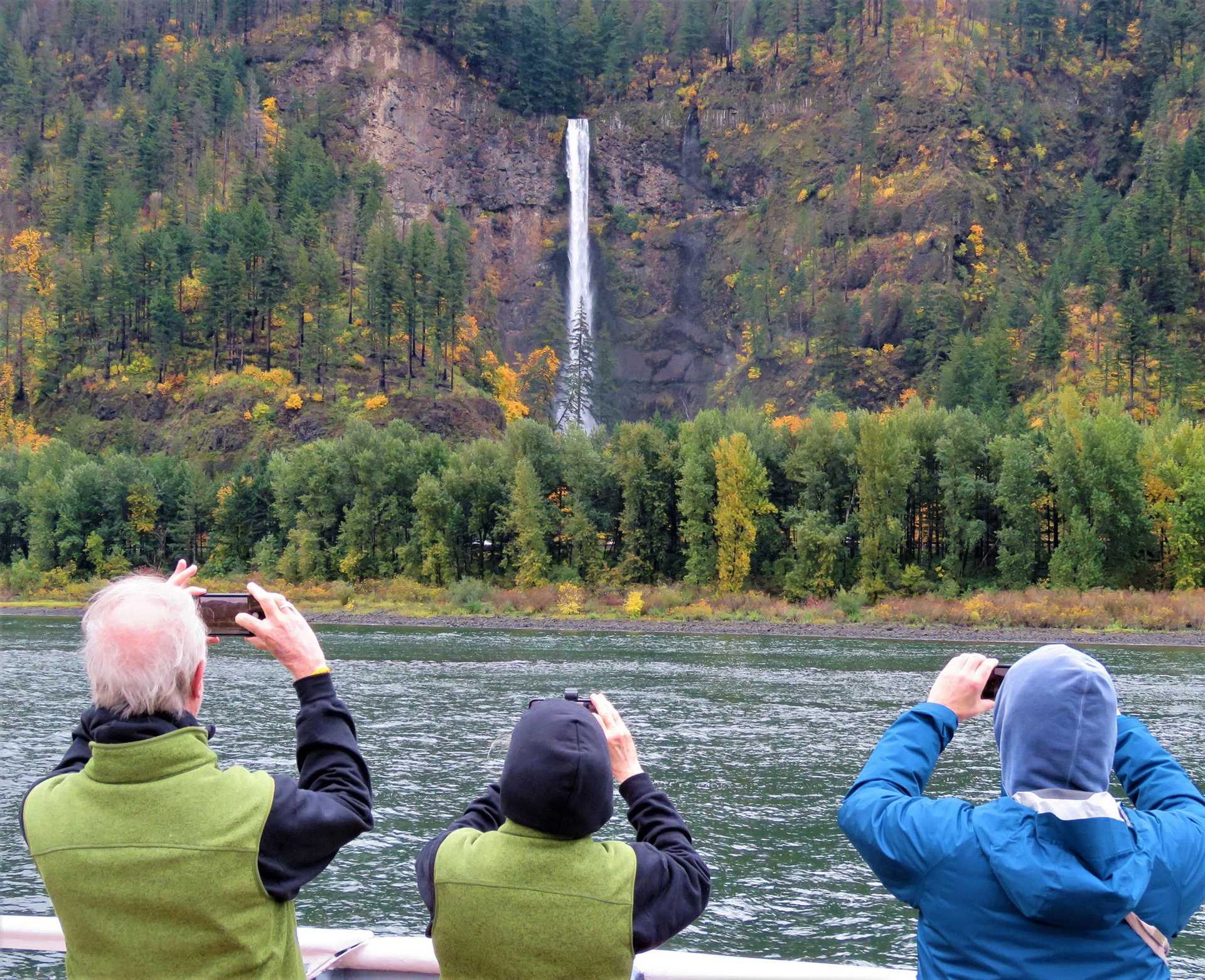 guests photographing multnomah falls