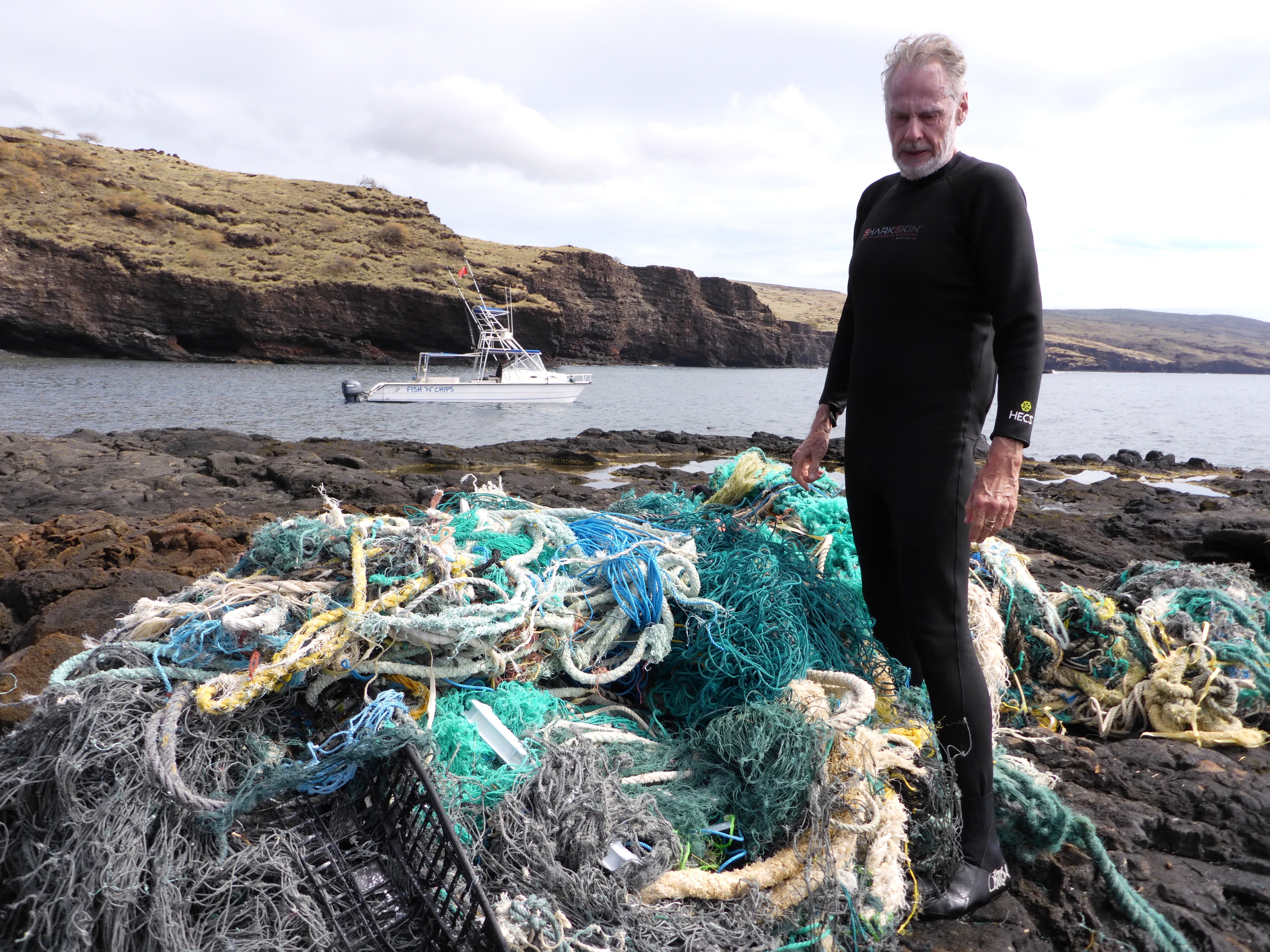 Sven On Shore with Nets.JPG