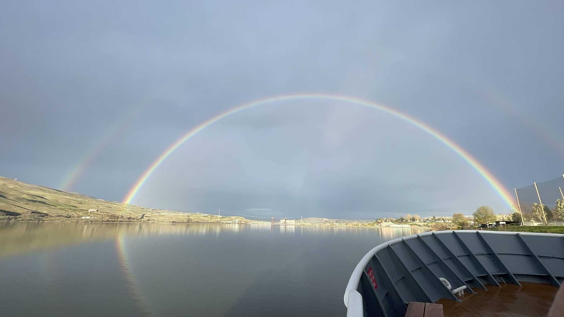 double rainbow spanning a river