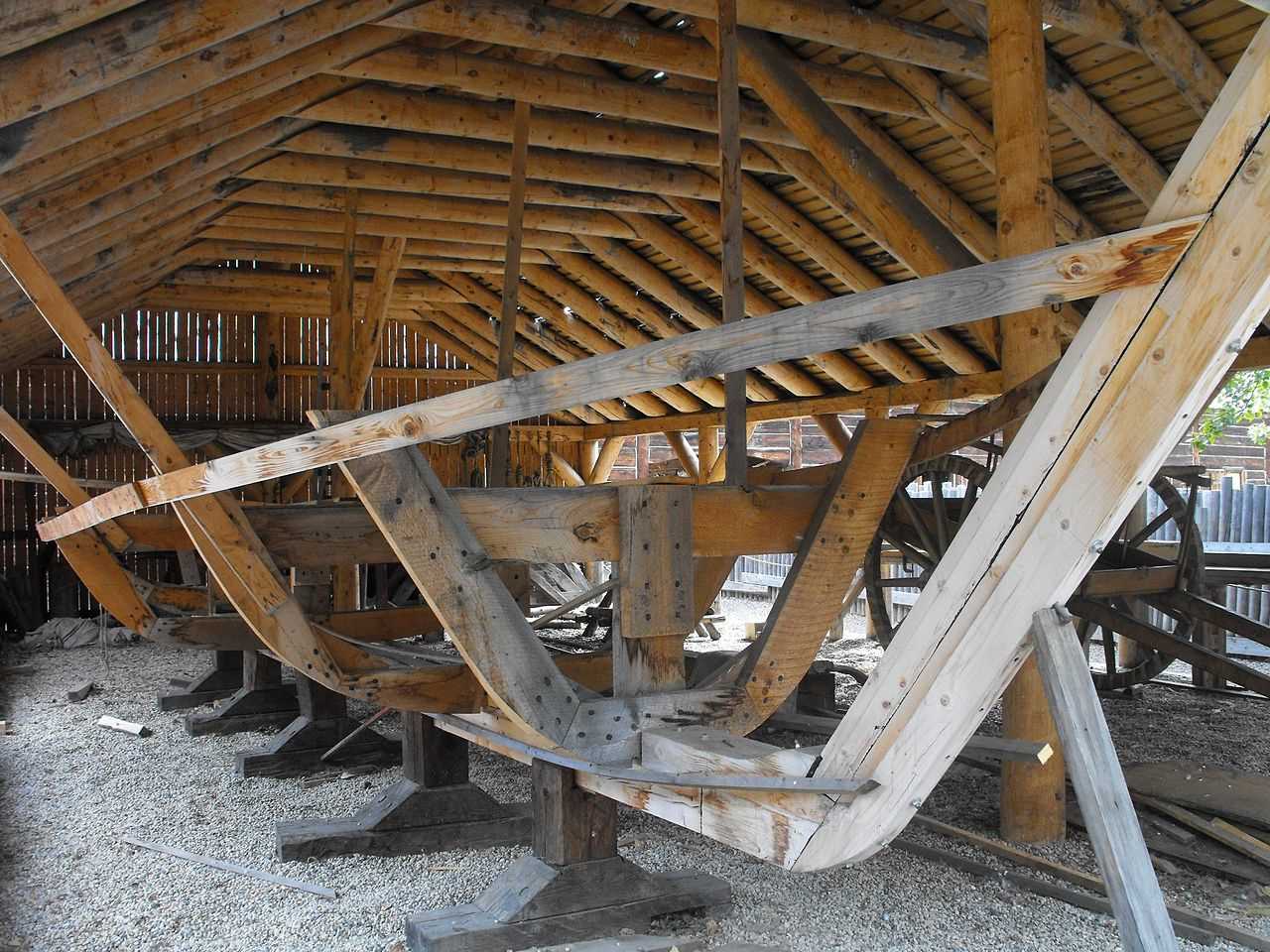 A viking ship replica's bare wooden frame