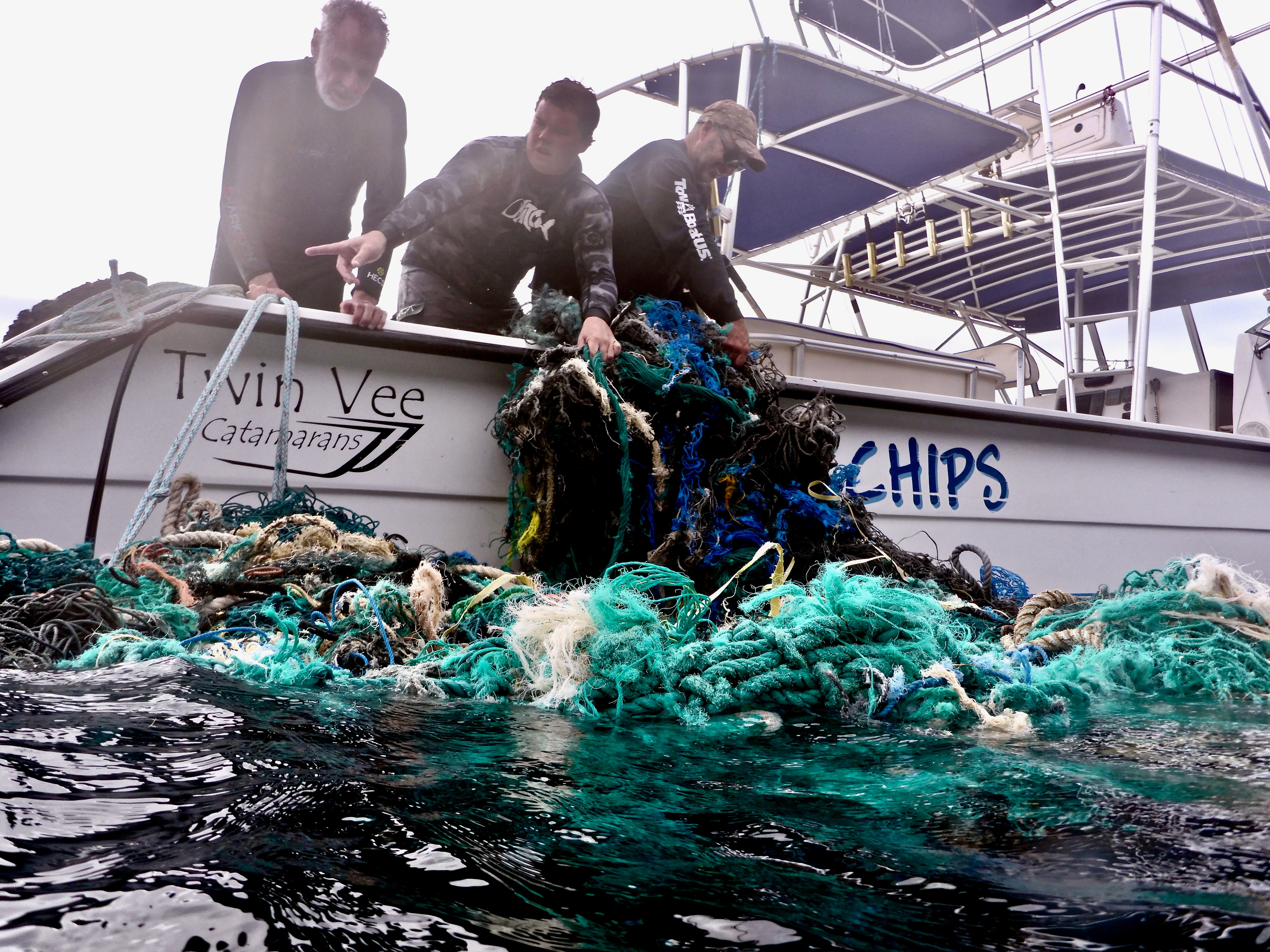 Sven Hauling Nets On Boat.jpg