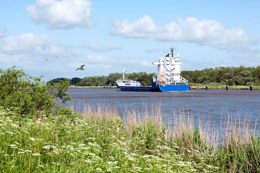 A Cargo Ship in the Idyllic Kiel Canal.jpg